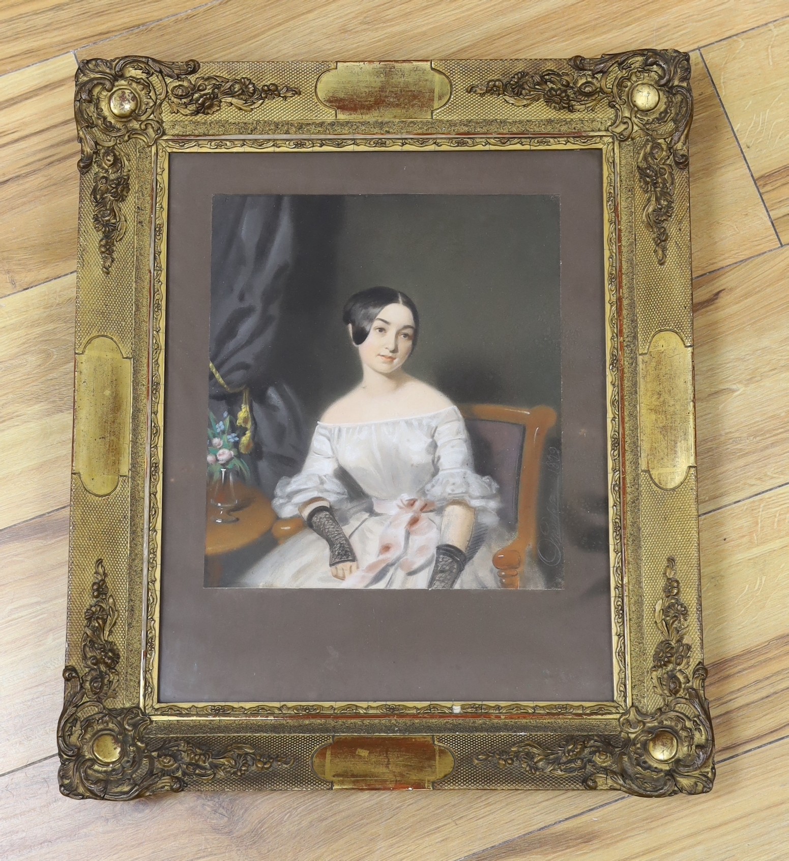 Mid 19th century German School, pastel, Portrait of a young lady, indistinctly signed and dated 1839, 28 x 25cm